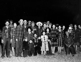 This photograph of Sioux workers from the Hastings Naval Ammunition Depot and their families appeared in the Hastings Daily Tribune on November 26, 1942