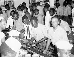 African American ammunition depot workers in the mess hall at the Hastings Naval Ammunition Depot, circa 1944