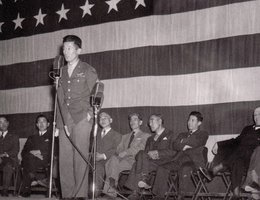 During the war, Ben Kuroki speaks at an event at the Heart Mountain, Wyoming relocation center. Coming from Nebraska as a poor dirt farmer, Kuroki thought he was not cut out for public speaking. Reports of his excellent speaking skills proved otherwise.