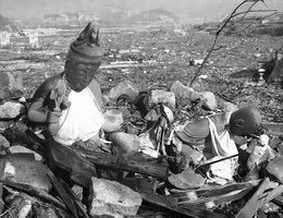 Battered religious figures stand watch on a hill above a tattered valley in Nagasaki, Japan; September 24, 1945, six weeks after the city was destroyed by the world’s second atomic bomb attack