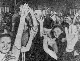 V-J Day, August 16, 1945. "On Farnam between Fifteenth and Sixteenth Streets (in Omaha). . . the jitterbugs had a field day. On the first bus (back) from the Martin-Nebraska Plant . . . a cheer for victory."