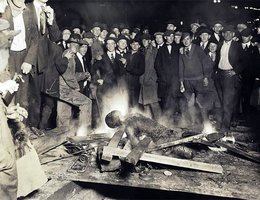 Some of the crowd grinned while watching the burning of Will Brown’s body; Omaha, Nebraska, Sept. 28, 1919