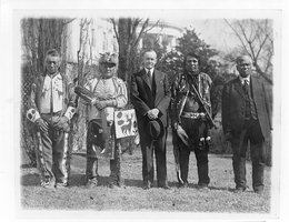 President Calvin Coolidge with four Osage Tribal members after Coolidge signed the bill granting Native Americans full citizenship, 1924