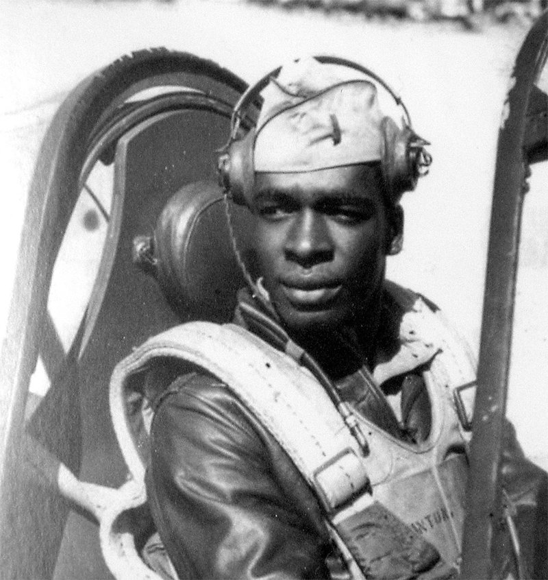 Lieutenant Colonel Paul Adams, Tuskegee Airman, 302nd Fighter Squadron, in the cockpit of his P40 plane