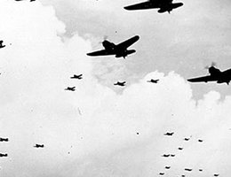 A formation of U.S. Navy carrier aircraft fly over the formal surrender ceremonies in Tokyo Bay on September 2, 1945; Official U.S. Navy Photograph