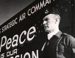 A sight Janie LeMay became used to: Staff Sergeant Billy Davis stands guard at the entrance to the Headquarters facilities of the Strategic Air Command, Offutt AFB, Nebraska, June 1959