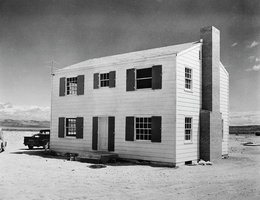 Before: two-story wood frame house at 5,500 feet from blast site, May 5, 1955