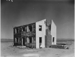 After: two-story wood frame house at 5,500 feet from blast site, May 5, 1955