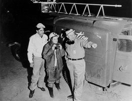 Melba Scott with Val Peterson (right), and Peterson’s assistant, Paul F. Wagner. Taken at the Operation Cue atomic bomb test site, 1955.