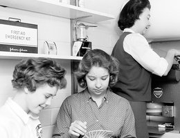 Mrs. Raymond Baker and her daughters Susan (left) and Shara Lynn in the family’s basement fallout shelter, 1960