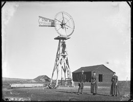 Sod House, Custer County, Nebraska, 1887 (Note the man halfway up the windmill)