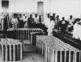 "Negro Enlisted Men at Work on the Load Line, U.S. Naval Ammunition Depot", Hastings, Nebraska, 1944(?)