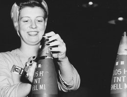 Cornhusker Ordnance Plant Photos: "At work on a shell casing"